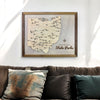 Wooden Ohio state park travel map hanging on wall above couch. 
