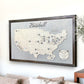 Wood professional baseball stadium travel map hanging on wall. 