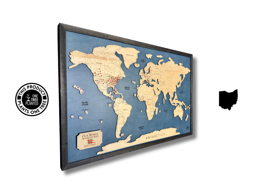 Wooden world travel map with pins to track travels. 